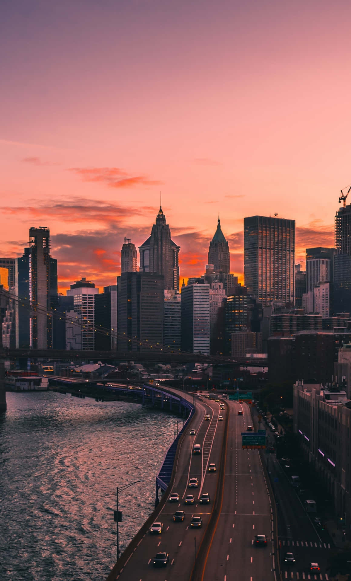 Get lost in the skyline of a beautiful city at sunset Wallpaper