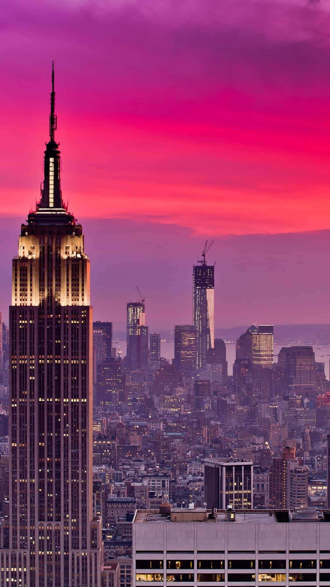 Fange det smukke i en by solnedgang fra din iPhone Wallpaper