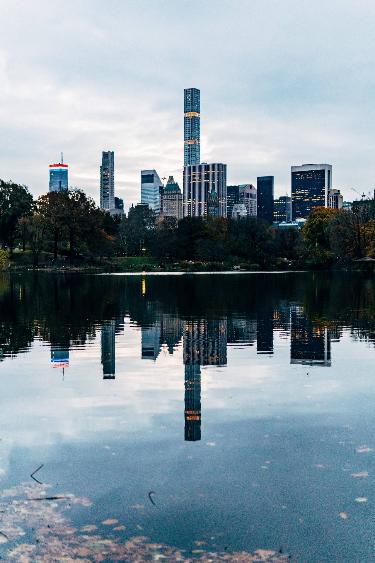 Cityscape Reflection In Central Park Wallpaper