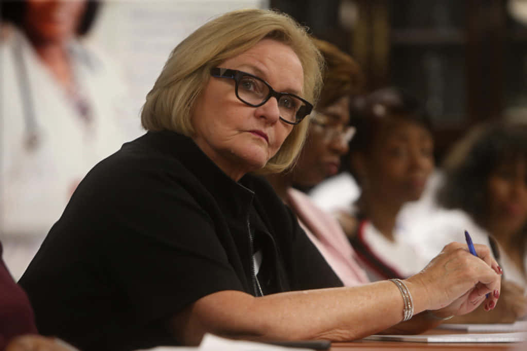Claire Mccaskill Looking At Speaker Background