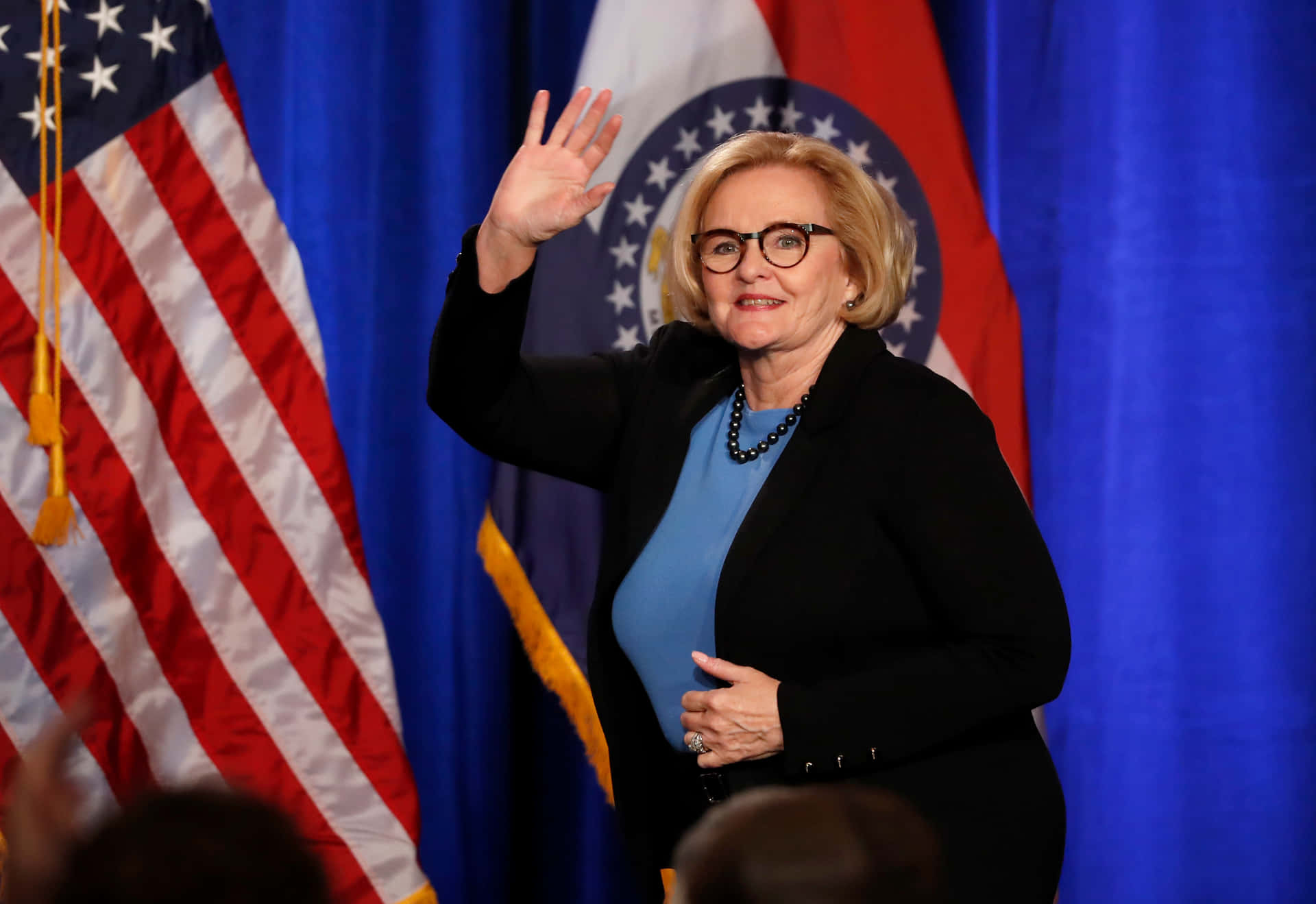 Claire Mccaskill Waving At Audience Wallpaper