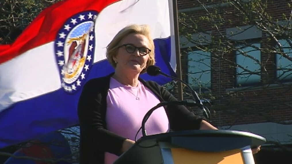Claire Mccaskill With Missouri Flag Wallpaper