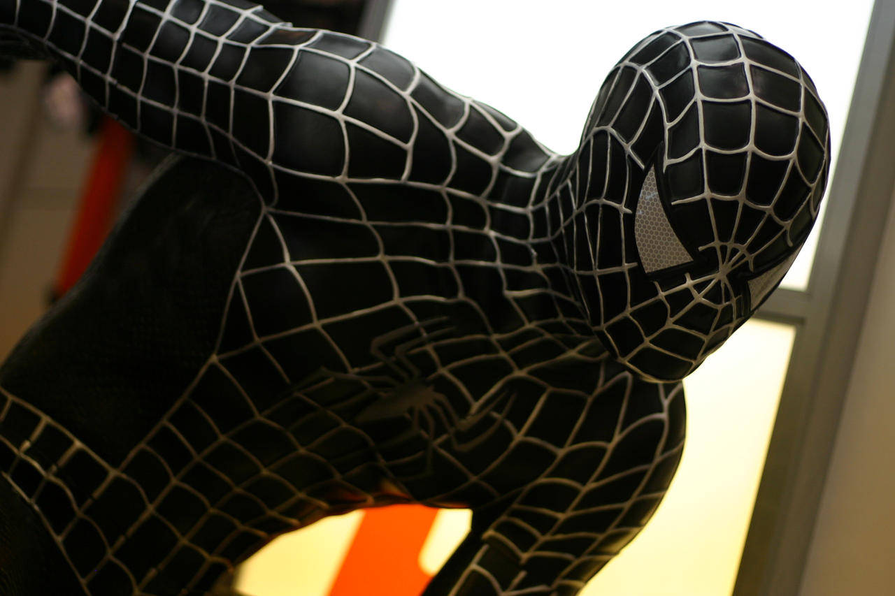 Klassisk Sort Spiderman Suit Wallpaper