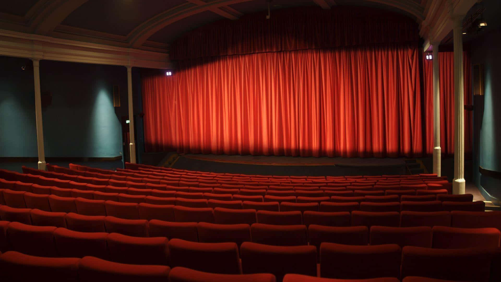 Classic Cinema Interior Red Seats Wallpaper