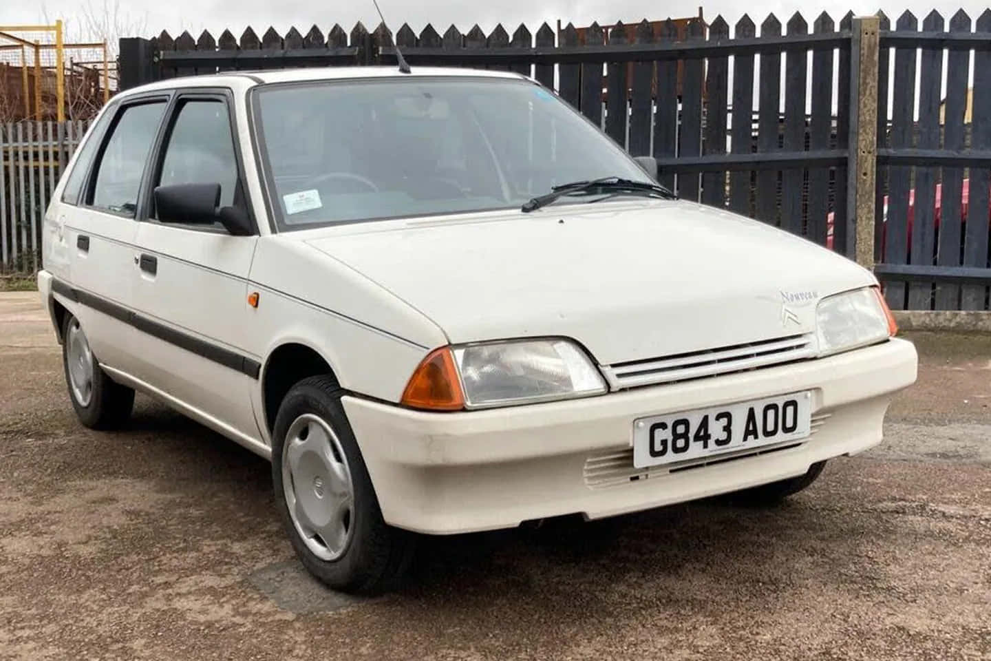 Classic Citroen Ax On Empty Road Wallpaper