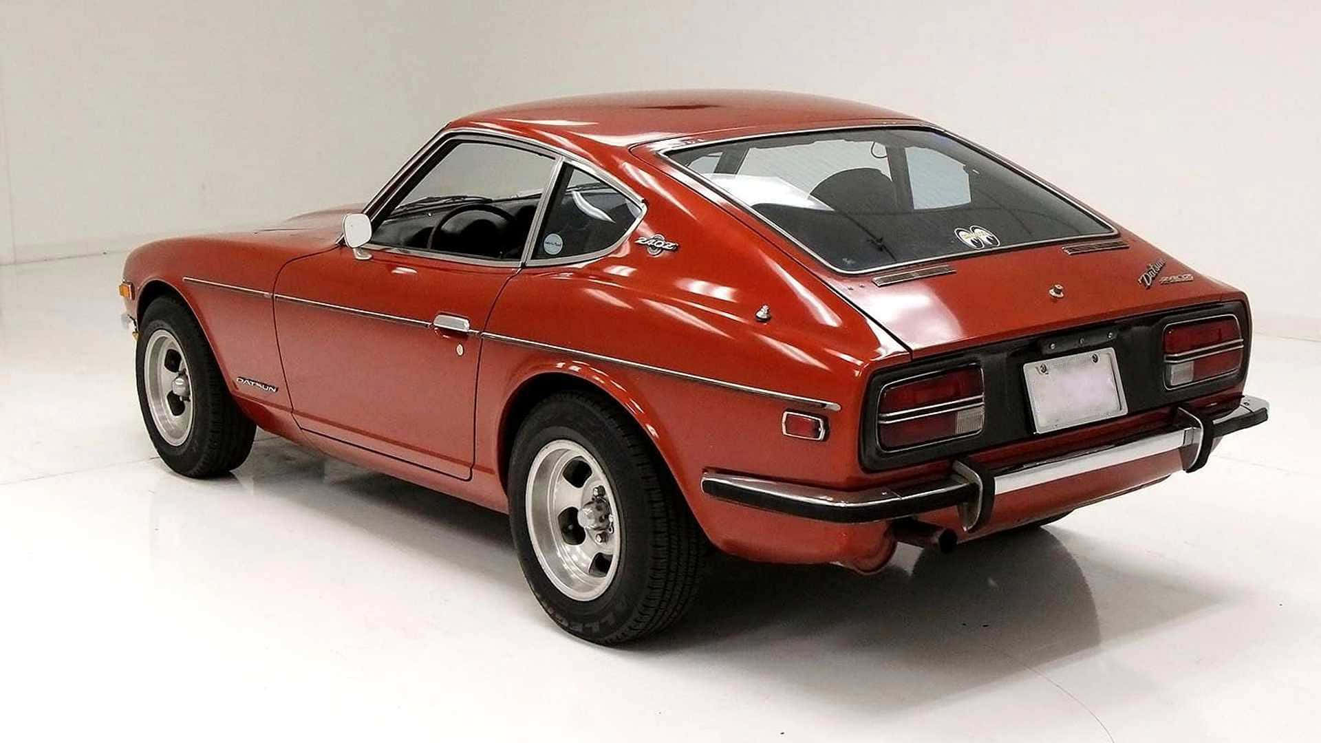 Klassinen Datsun 240z Toiminnassa Taustakuva