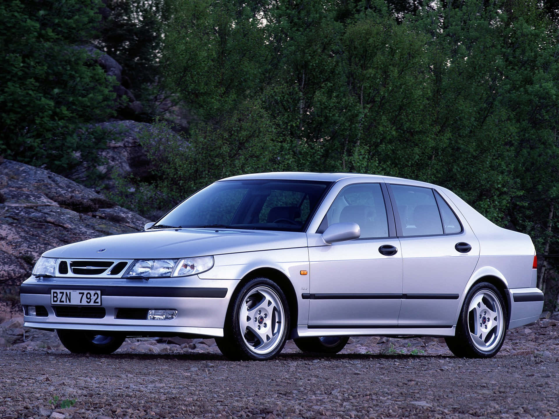 Classic Elegance - Saab 9-5 On A Picturesque Route Wallpaper