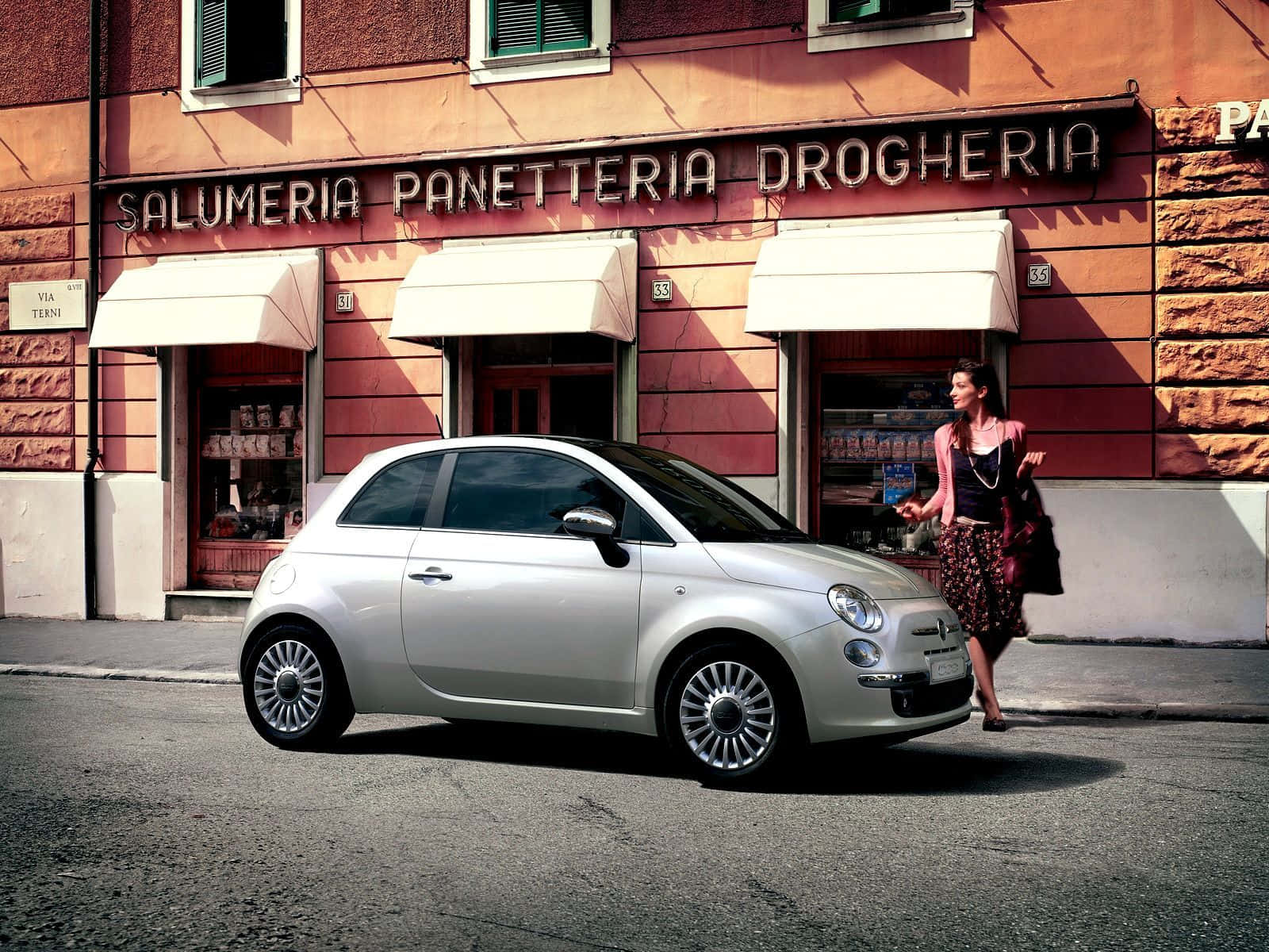 Classic Fiat Cinquecento In A Stunning Urban Background Wallpaper