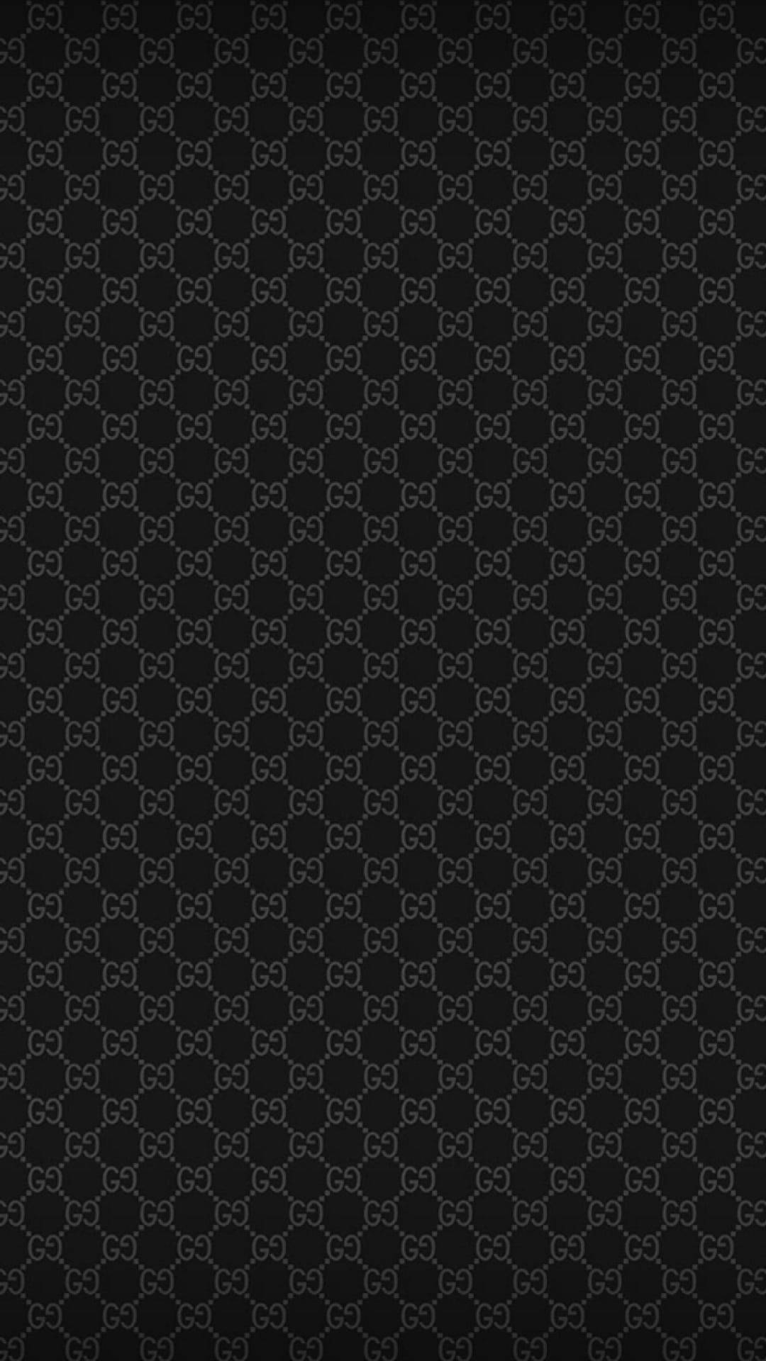 Patrónclásico Negro De Moda Con El Logotipo Gucci. Fondo de pantalla
