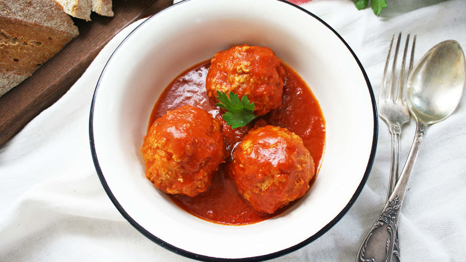 Classic Meatballsin Tomato Sauce Wallpaper