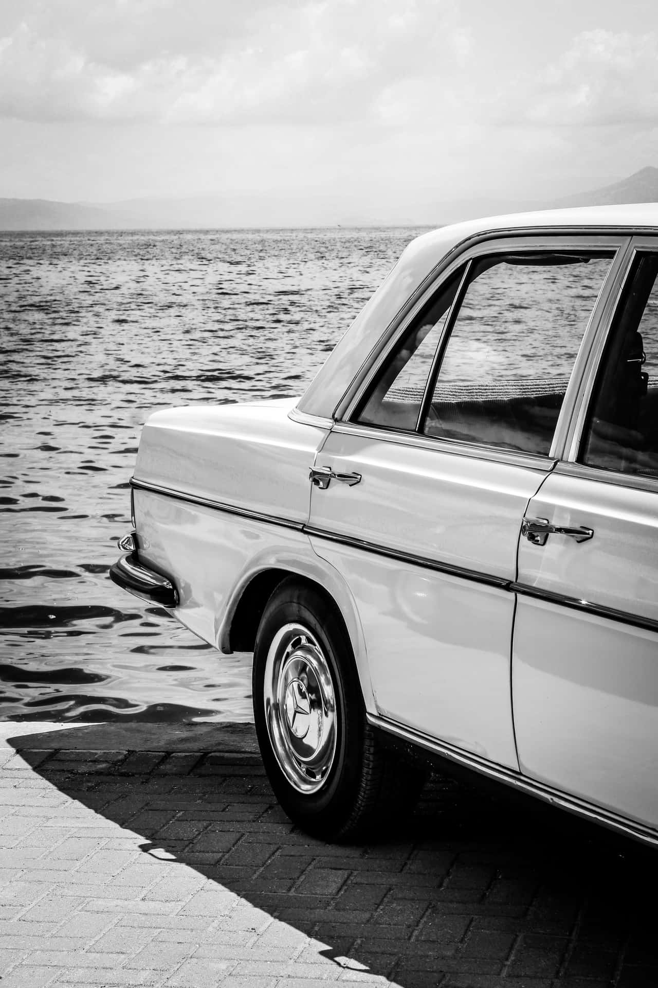 This classic Mercedes E-Class Sedan is the epitome of luxury Wallpaper