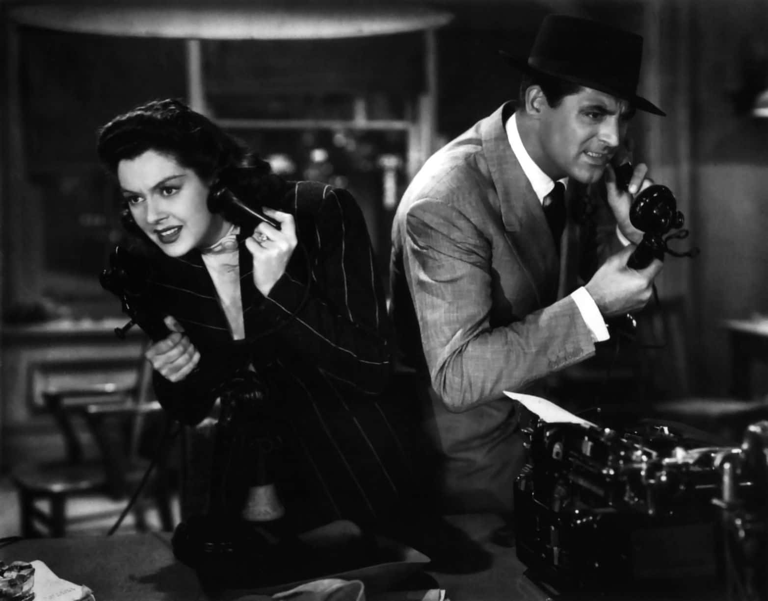 Iconic Scene from Classic Black and White Noir Movie Wallpaper