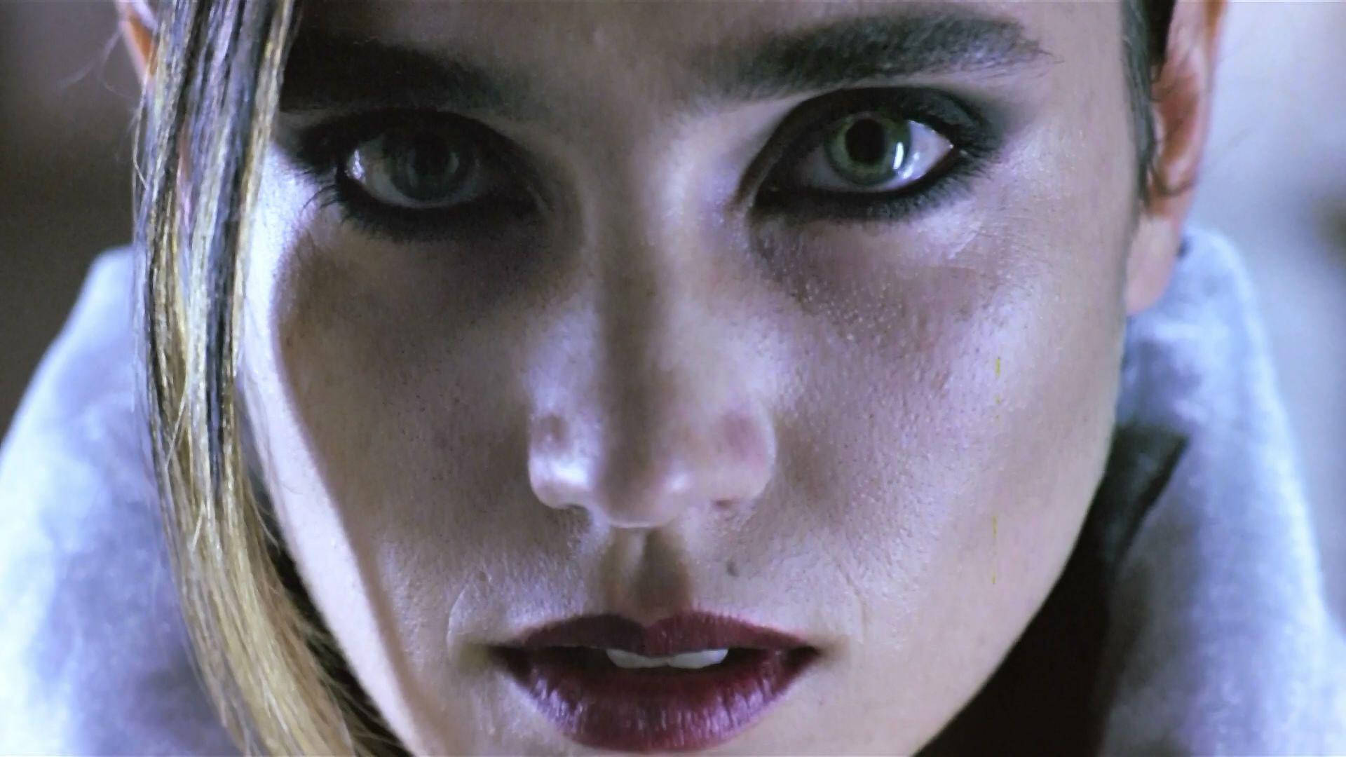 Jennifer Connelly in a Classic Scene from Requiem for a Dream Wallpaper