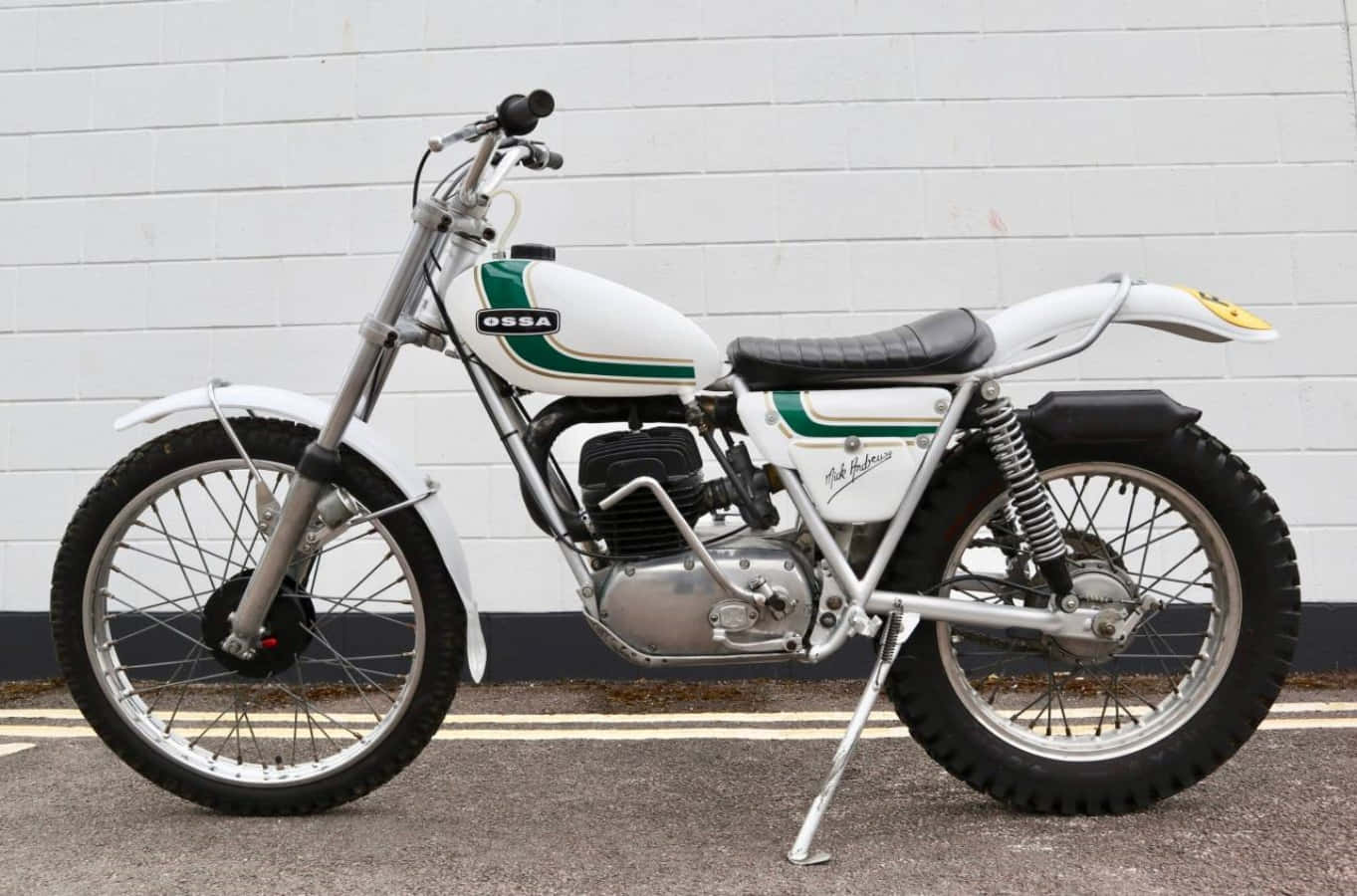 Classic Ossa Motorcycle In Action Wallpaper