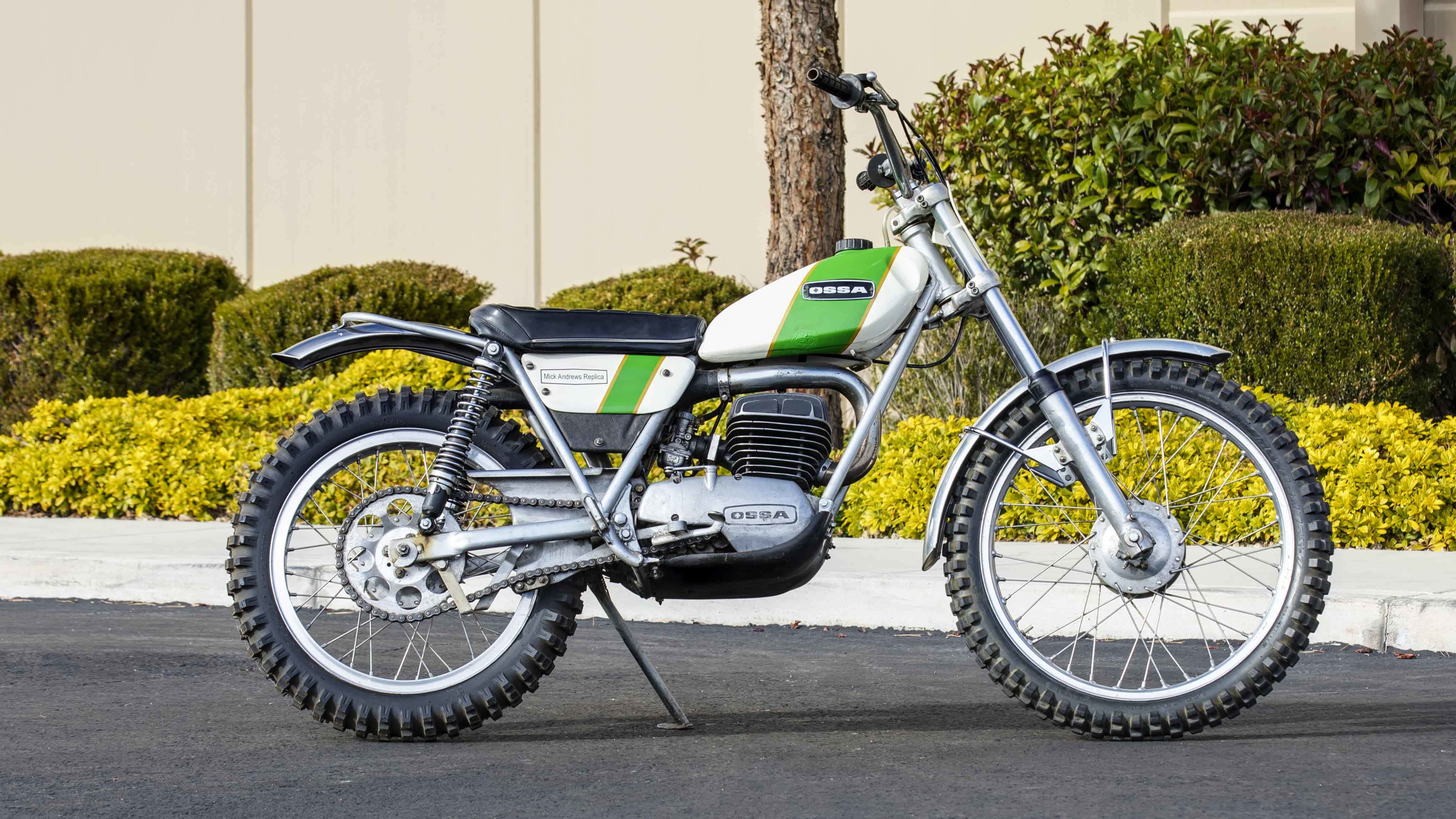 Classic Ossa Motorcycle In Action Wallpaper