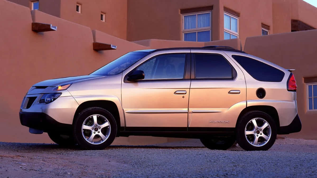 Classic Pontiac Aztek In Vibrant Setting Wallpaper