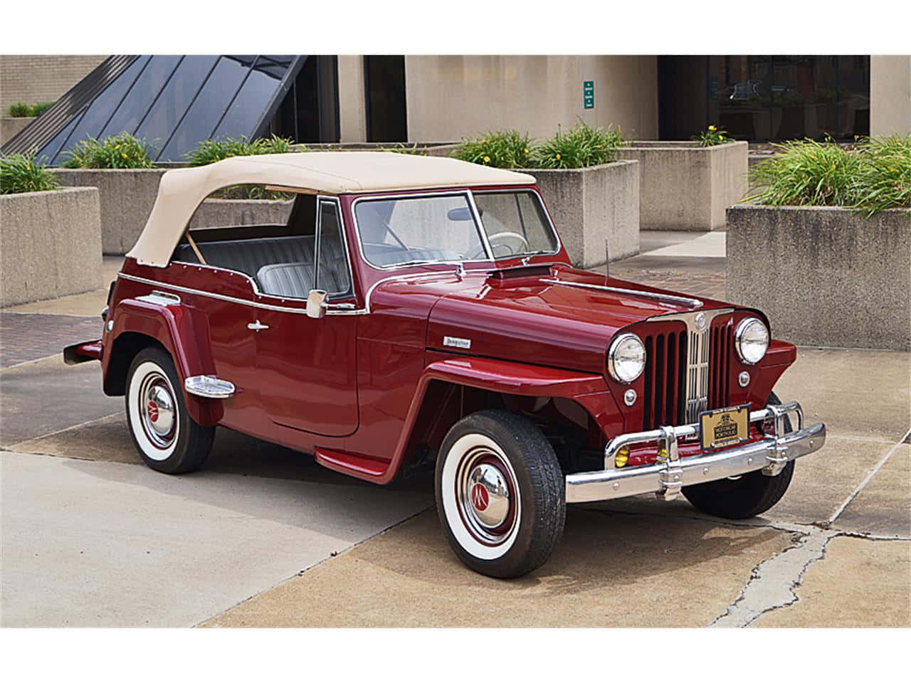 Classic Red Jeepster Adventuring Off-road Wallpaper