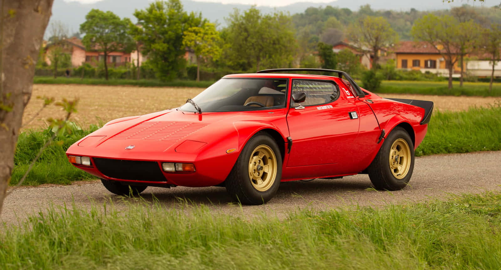 Classic Rode Lancia Stratos Zijaanzicht Achtergrond