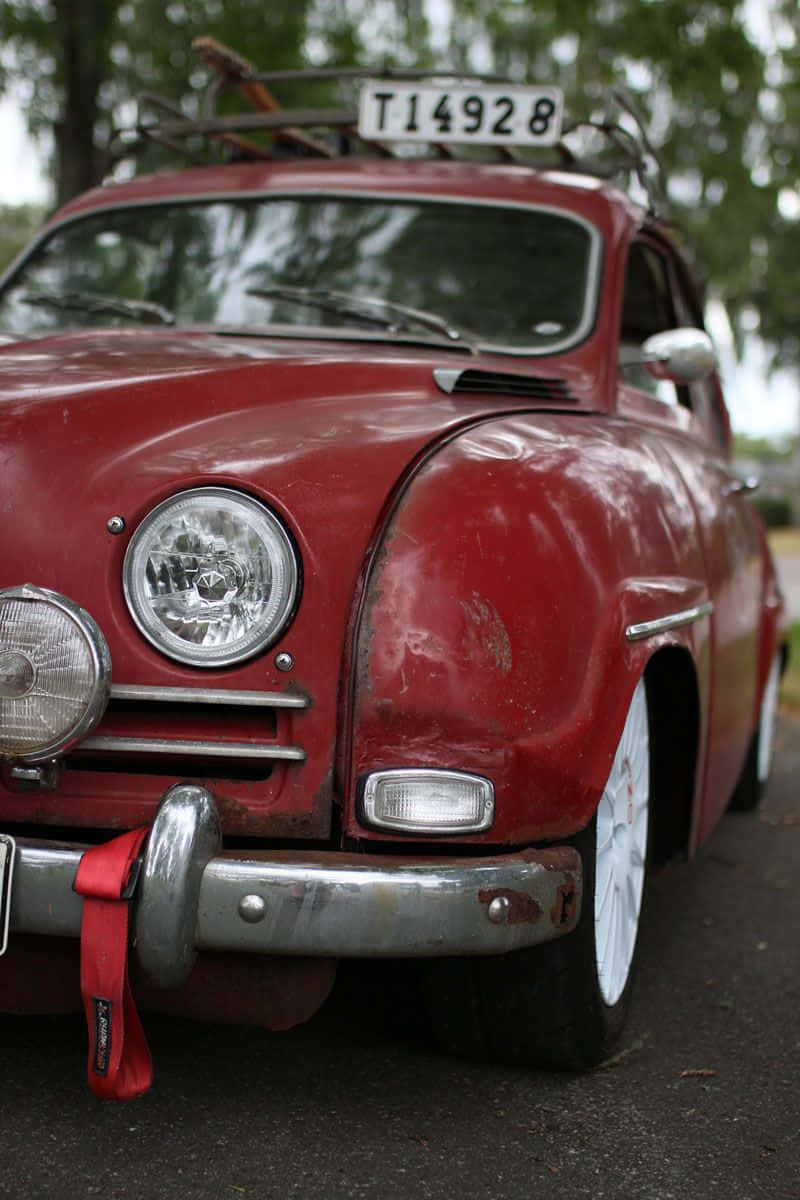 Classic Saab 96 On Open Road Wallpaper