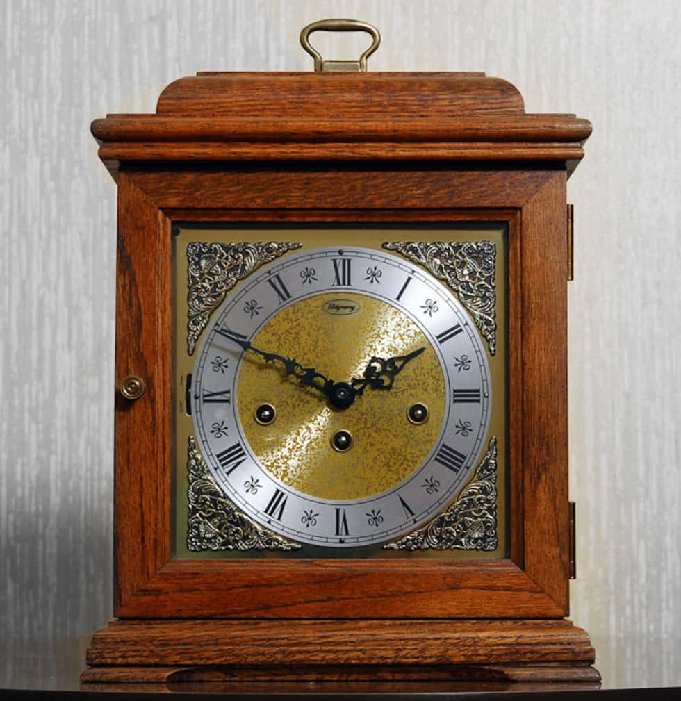 Classic Vintage Clock On A Wooden Surface