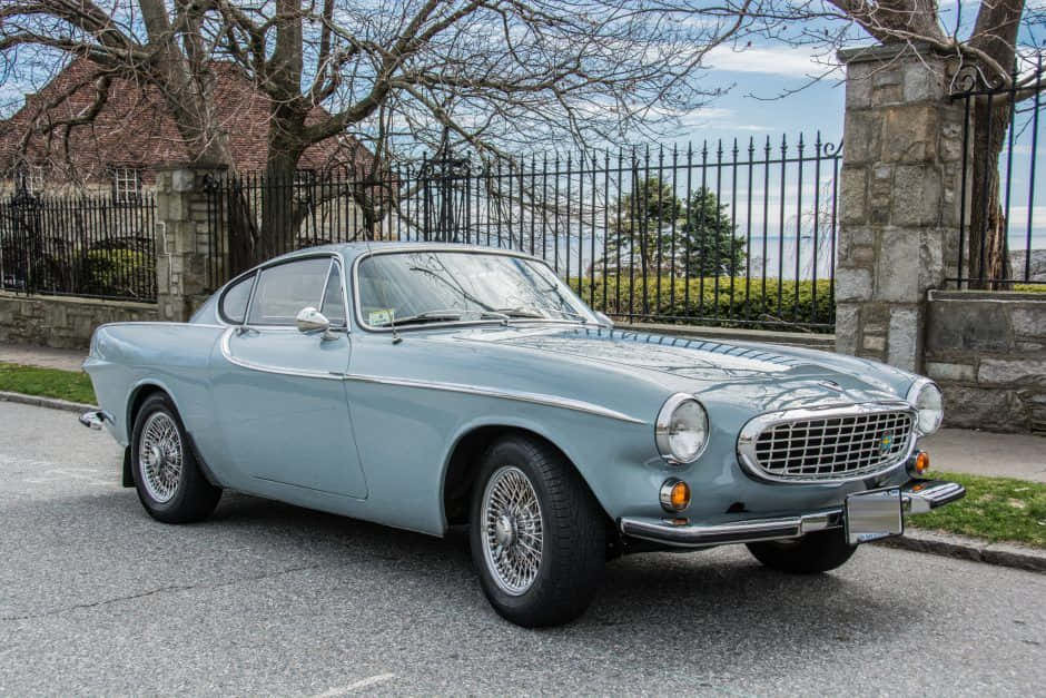 Classic Volvo P1800 - Precision And Elegance Wallpaper