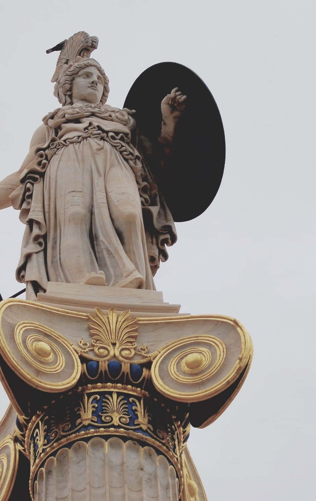 Classical Statue With Shield And Plume Wallpaper