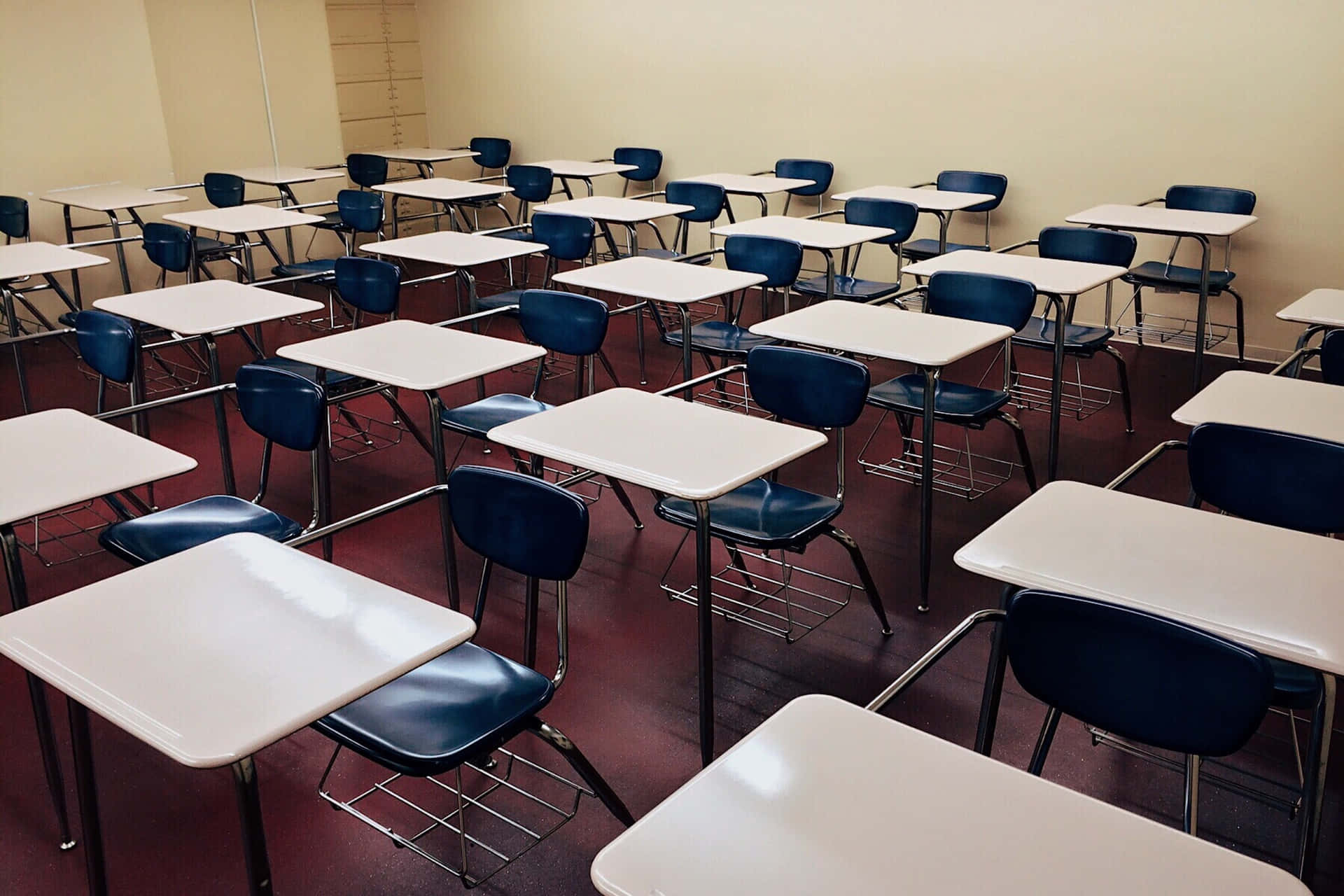 White Tables And Black Chairs Classroom Background