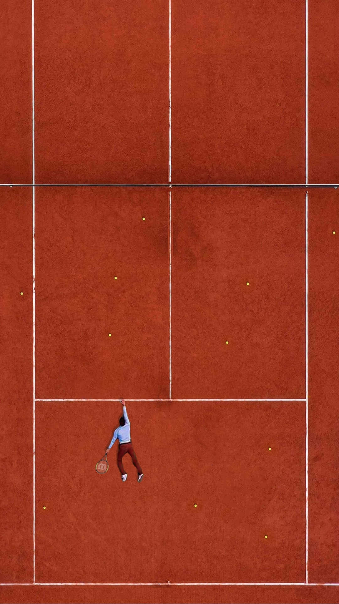 Clay Court Tennis Player Aerial View.jpg Wallpaper