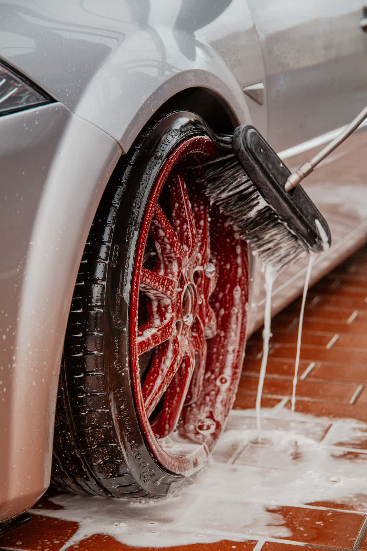 Cleaning Car Tire Wallpaper