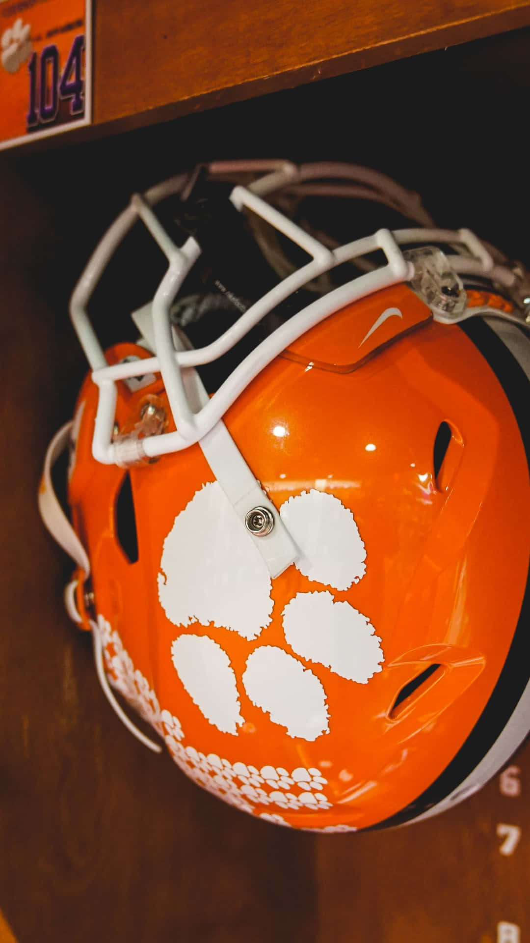 Clemson Tigers Football Helmet In Locker Wallpaper