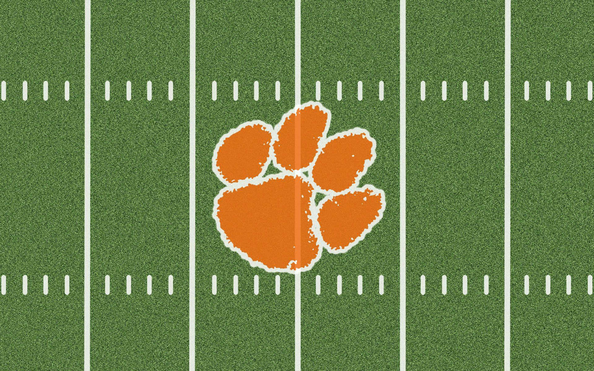 Clemson Tigers Football Logo On Field Wallpaper