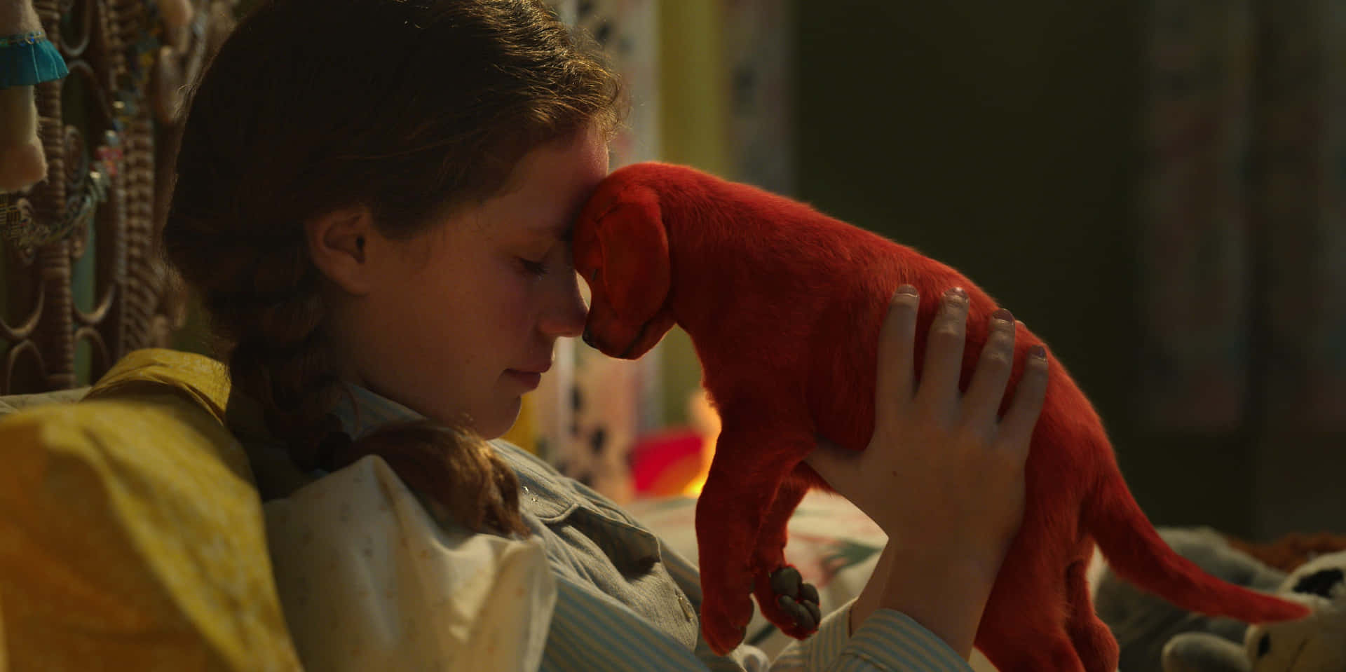 A Girl Is Hugging A Red Dog In Bed