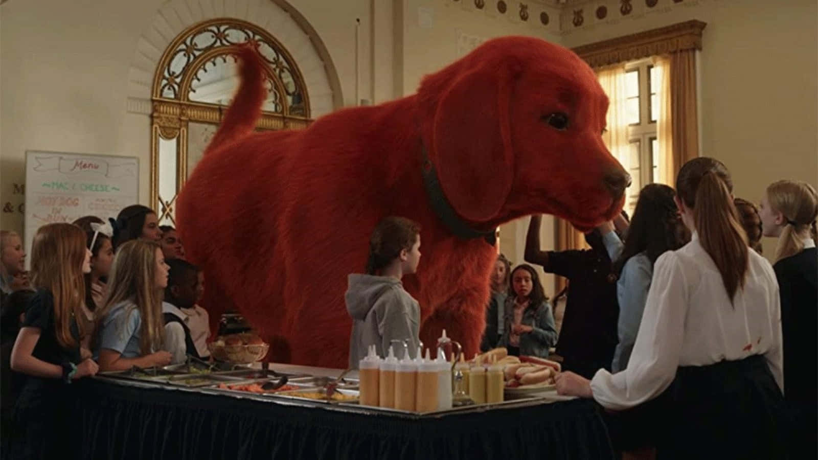 A Large Red Dog Standing In Front Of A Group Of People