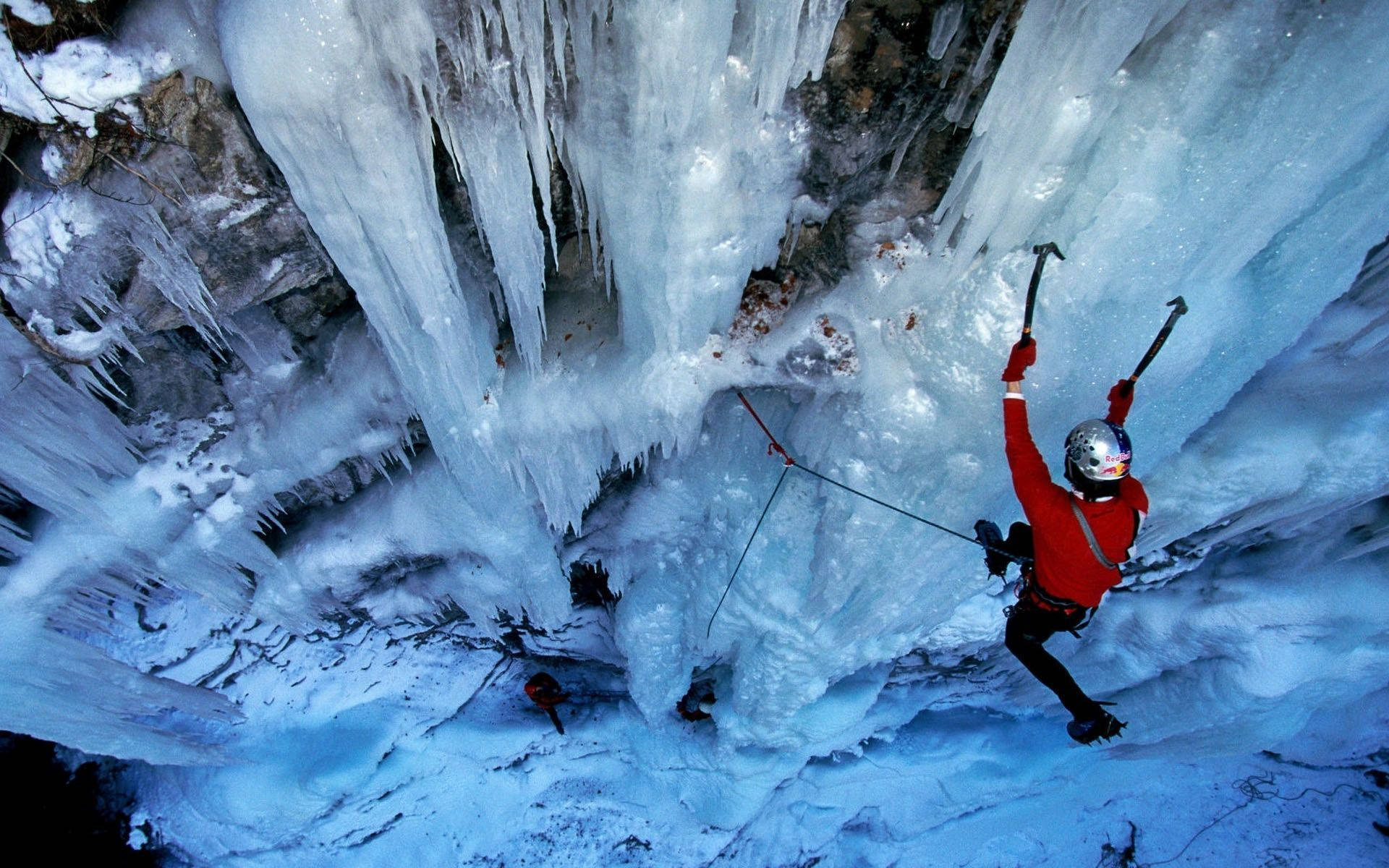 Climbing Man With Ice Axes Wallpaper
