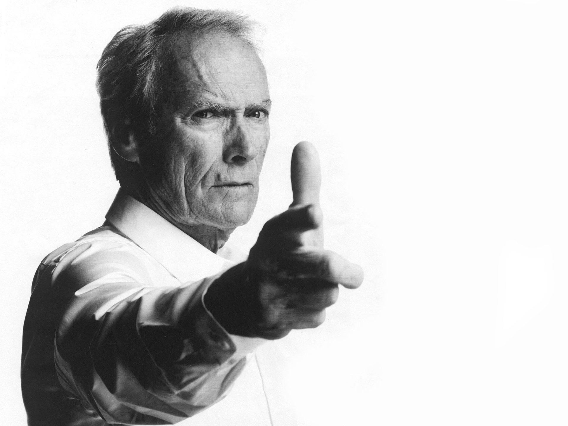 Clint Eastwood Finger Gun Tapet Wallpaper