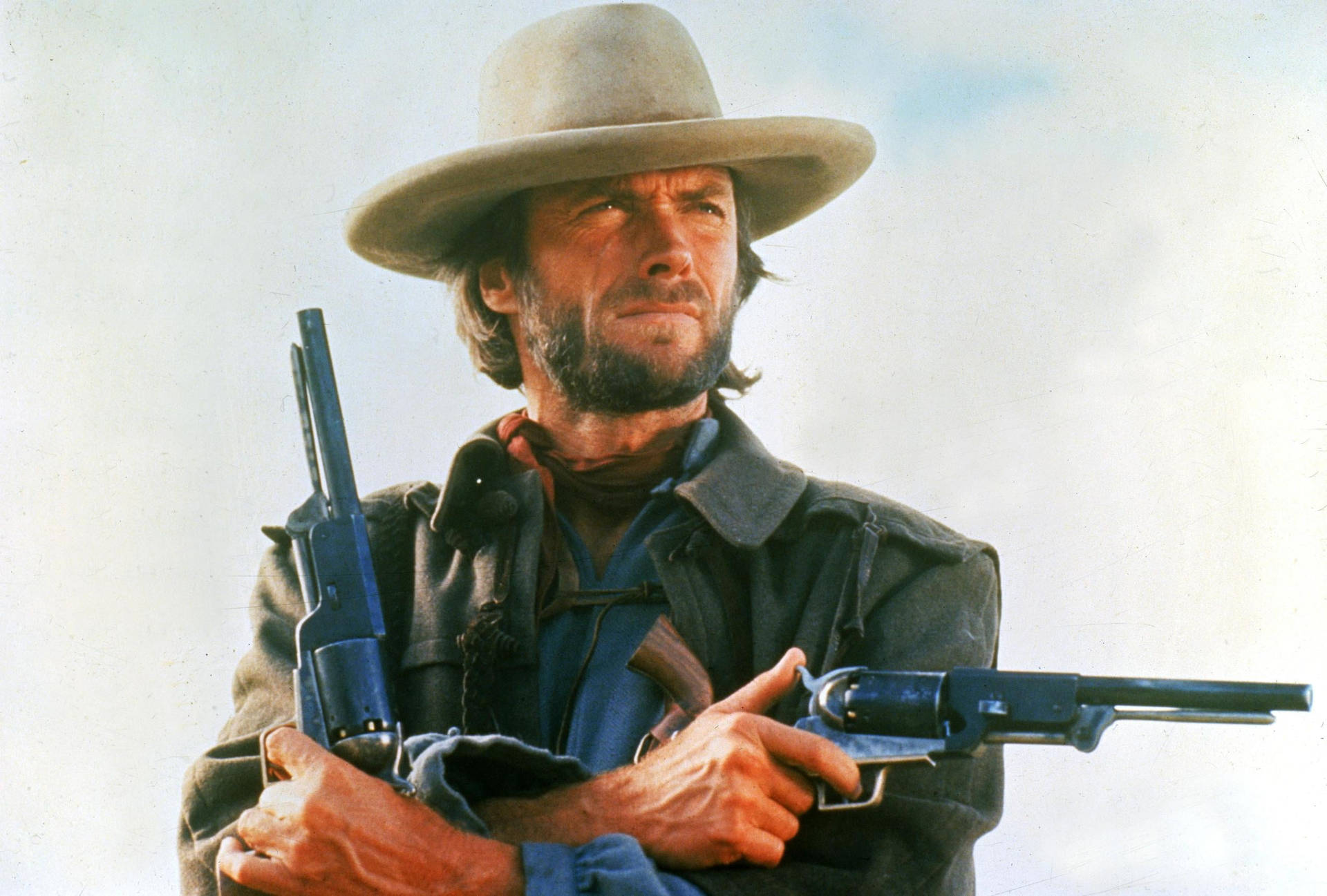 Clint Eastwood Outlaw Josey Wales tegner sine geværer Wallpaper