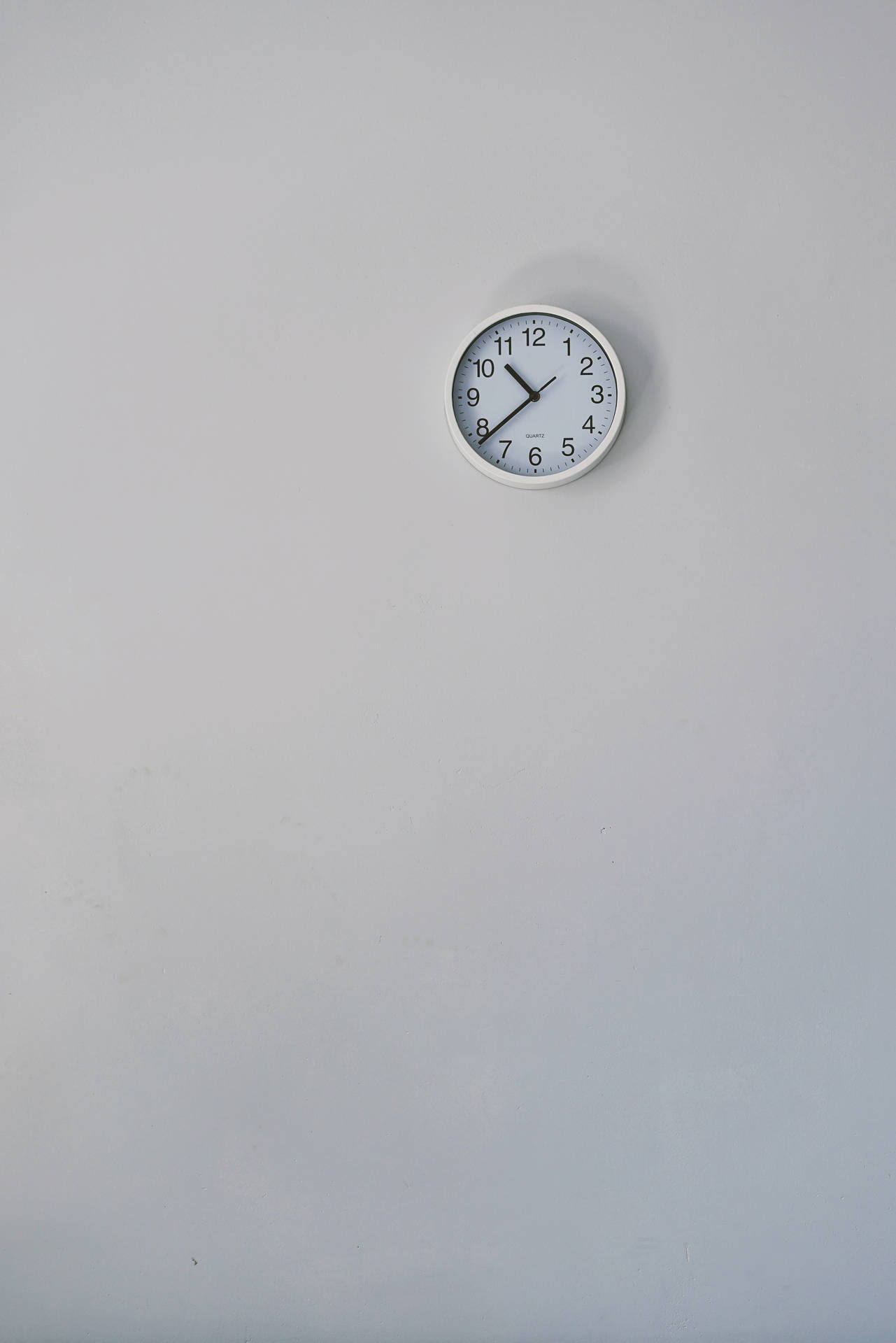 Clock On White Wall Wallpaper