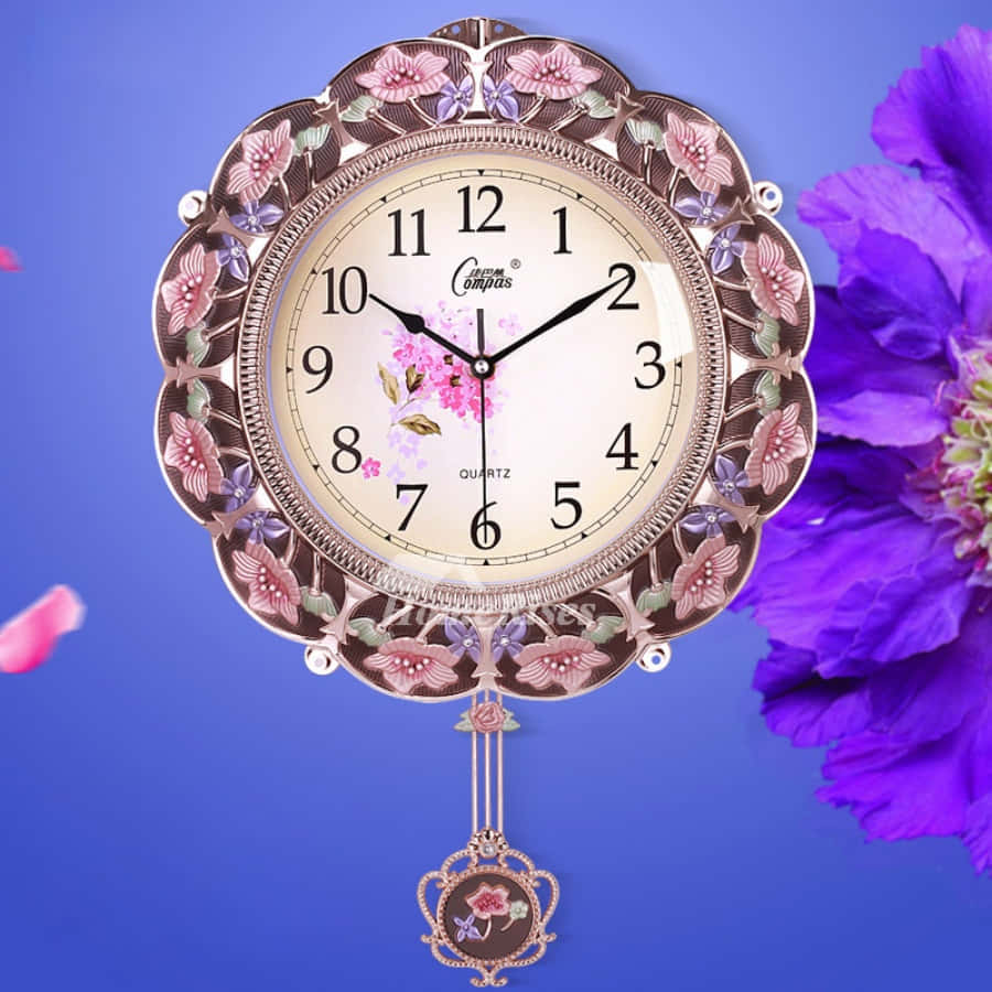 A Clock With Flowers And A Flower Hanging From It