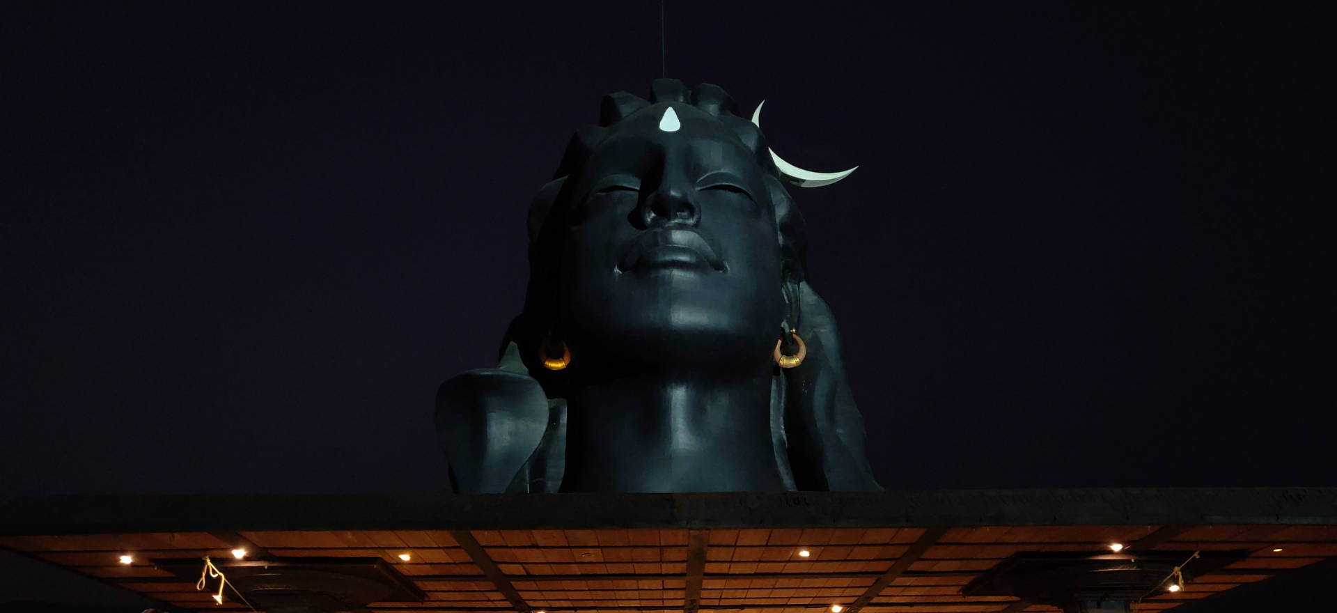 Close-Up Adiyogi Shiva At Night Wallpaper