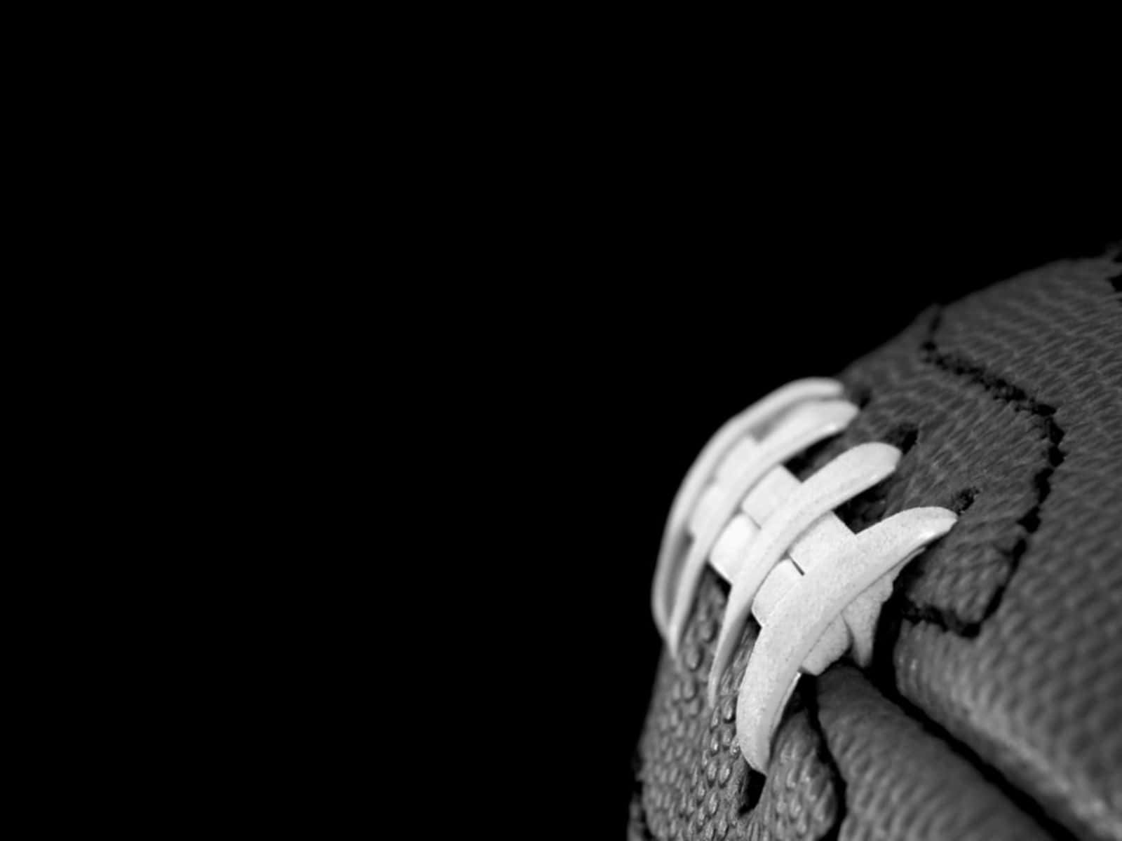 Close Up Football Laces Blackand White Wallpaper