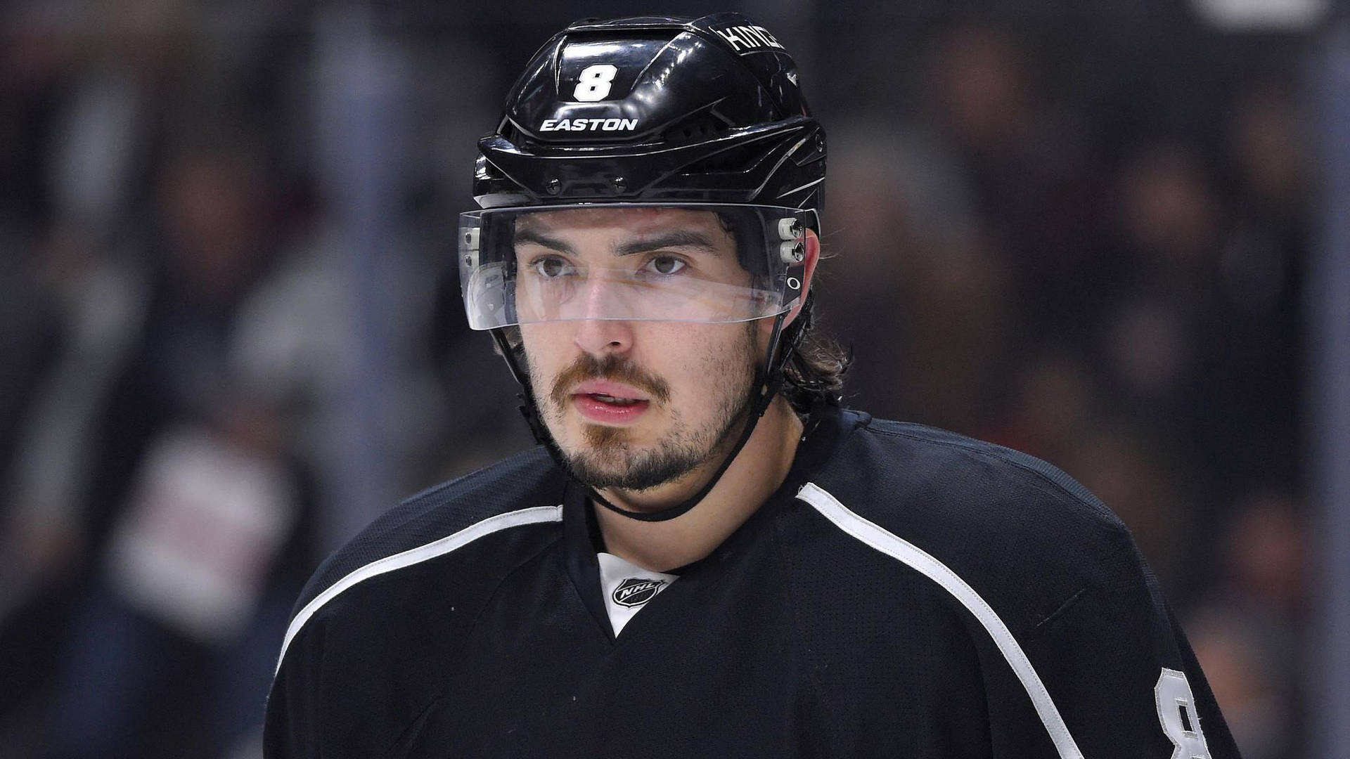Close Up Look Of Drew Doughty Biting Lip While Focusing On Game Wallpaper