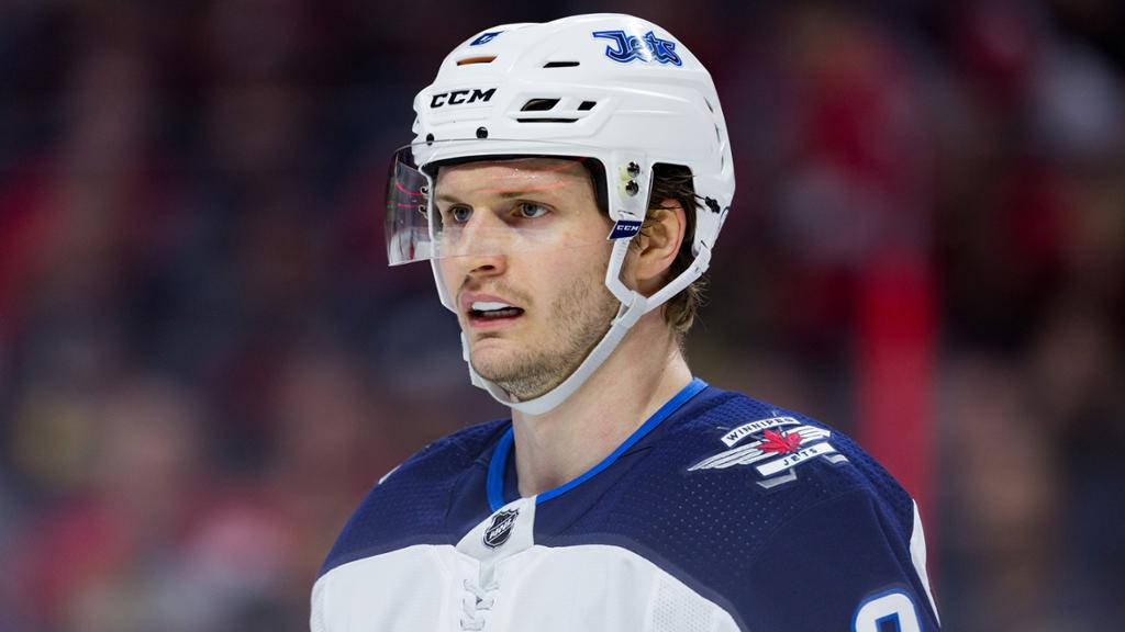 Close Up Look Of Jacob Trouba Looking To The Right With Irate Expression Wallpaper