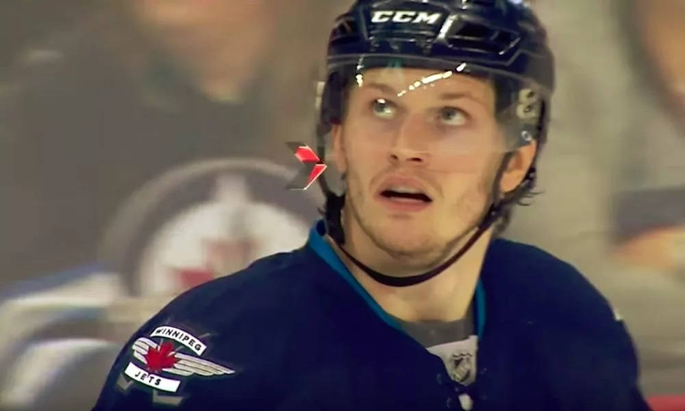 Close Up Look Of Jacob Trouba Looking Up To The Right With Mouth Open Wallpaper