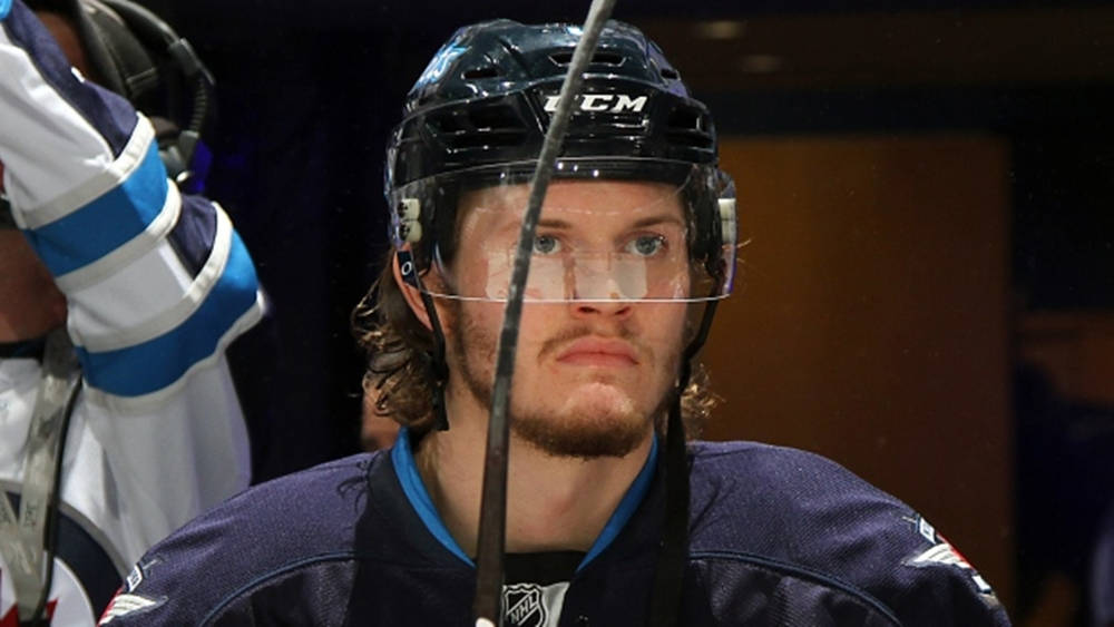 Close Up Look Of Jacob Trouba Showing Irate Expression While Looking In Front Wallpaper