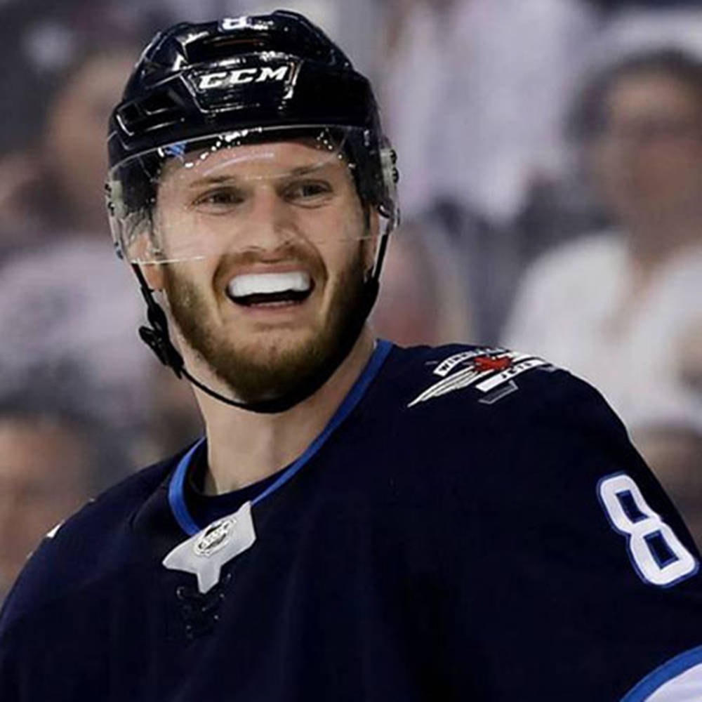 Close Up Look Of Jacob Trouba Smiling While Wearing Protective Mouthpiece Wallpaper