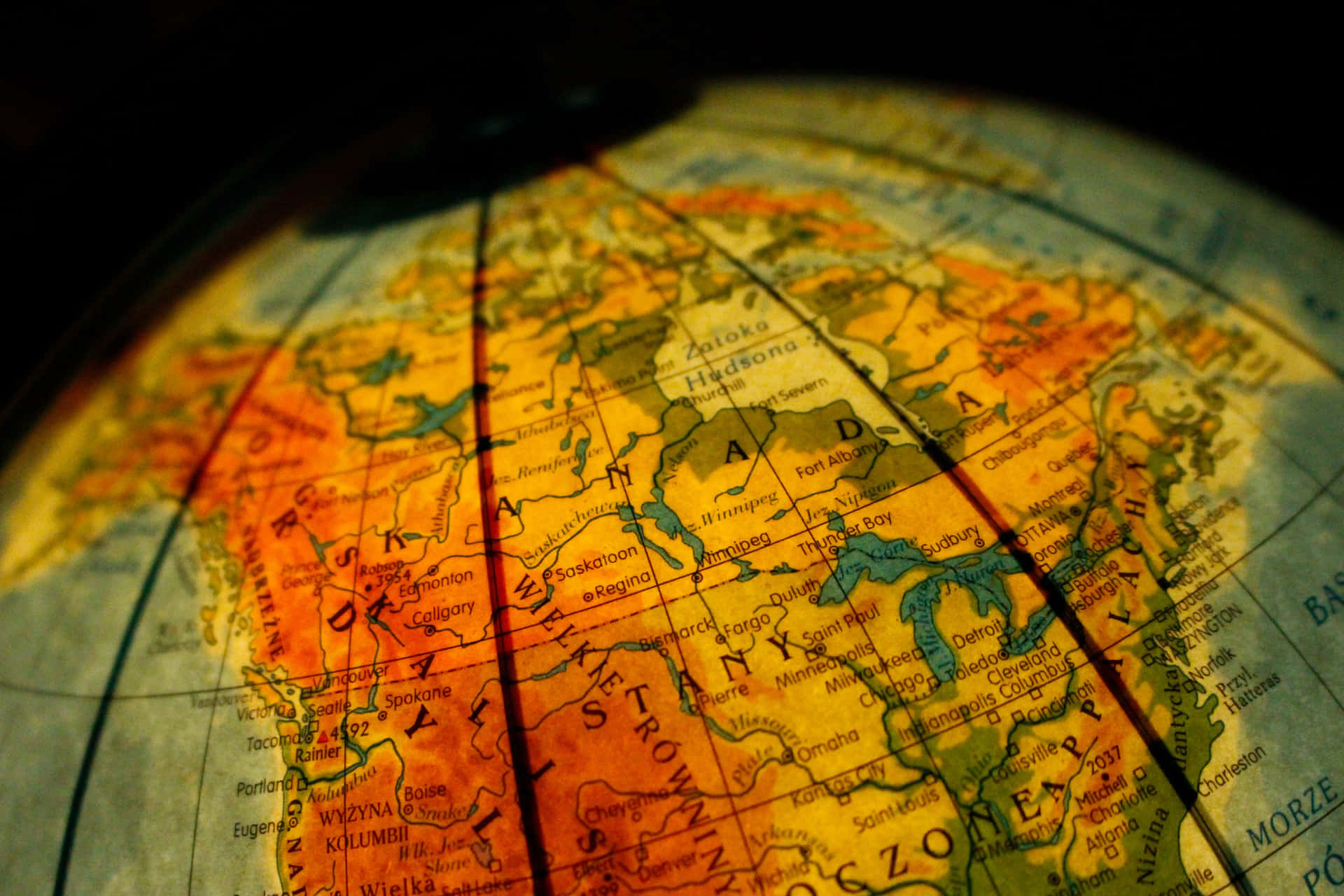 Close-up Of Glowing Globe Map Wallpaper