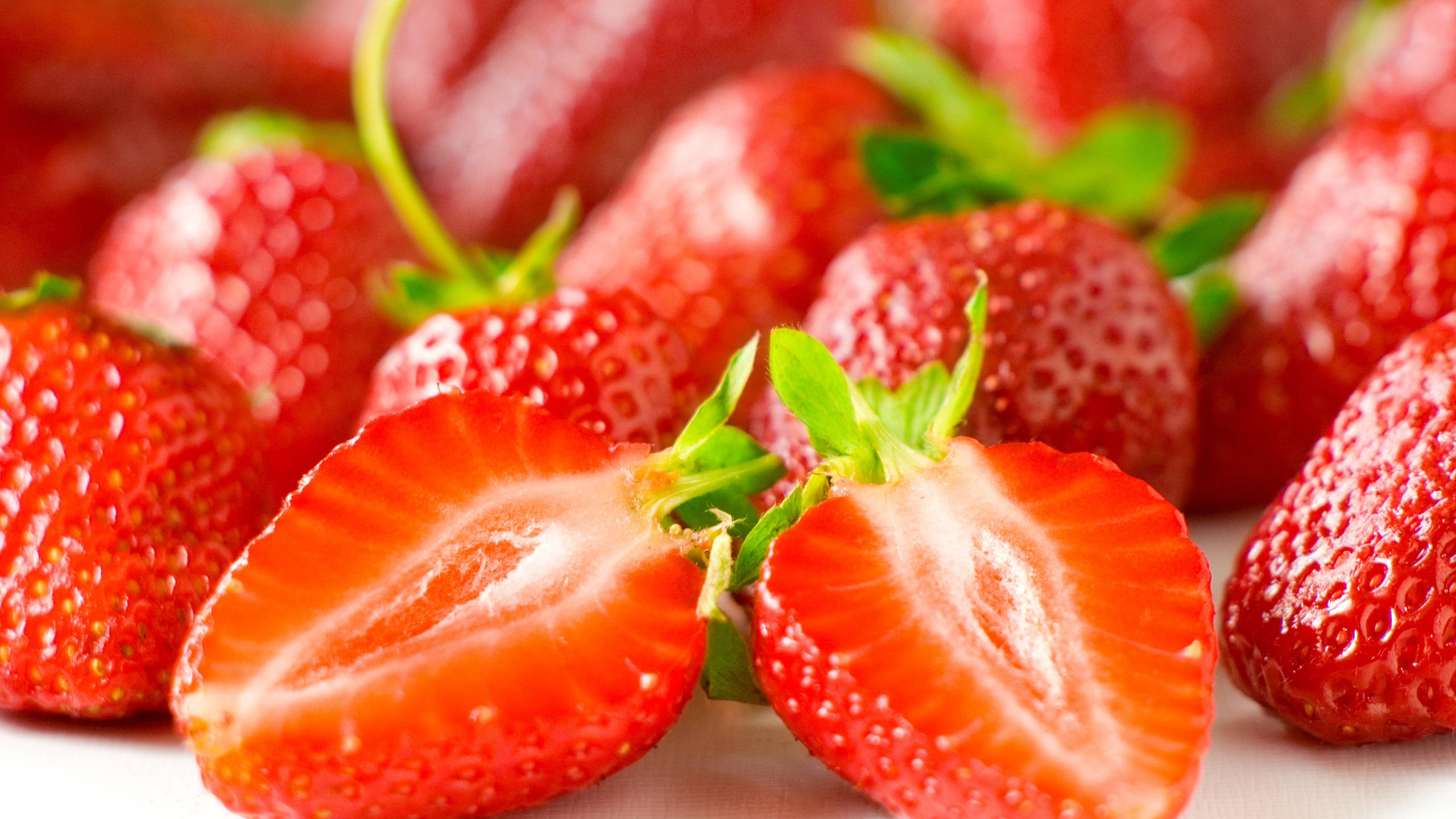 Close-up Of Halved Strawberry Desktop Wallpaper