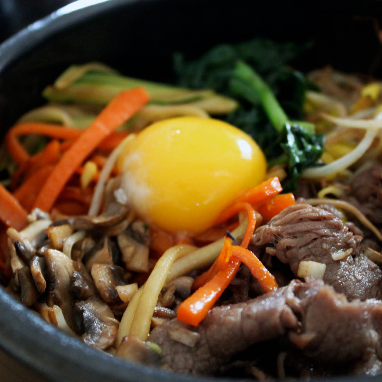 Close Up Of The Raw Egg On A Bibimbap Picture