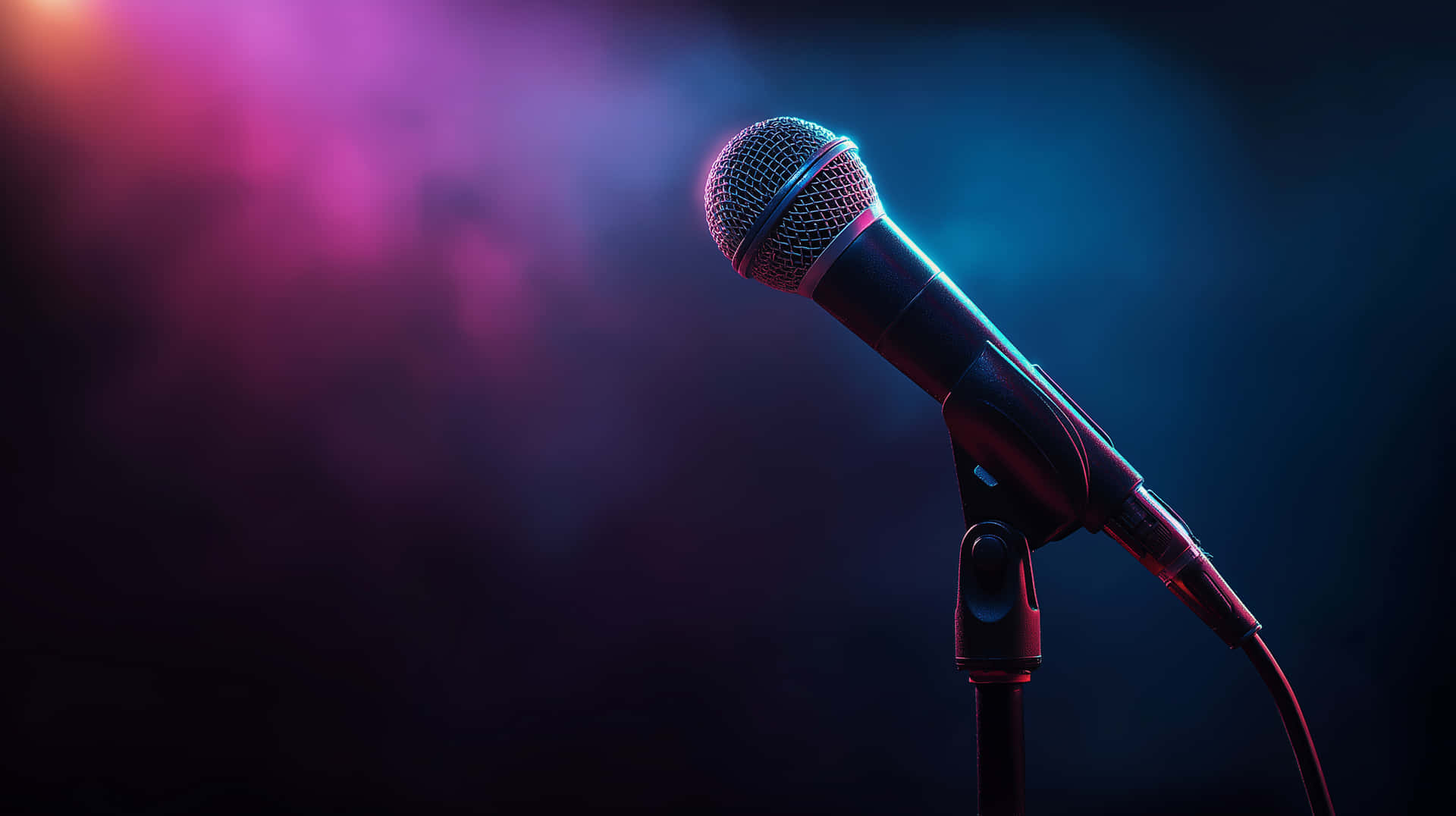Close-up Stage Microphone With Dynamic Colorful Light Reflections Wallpaper