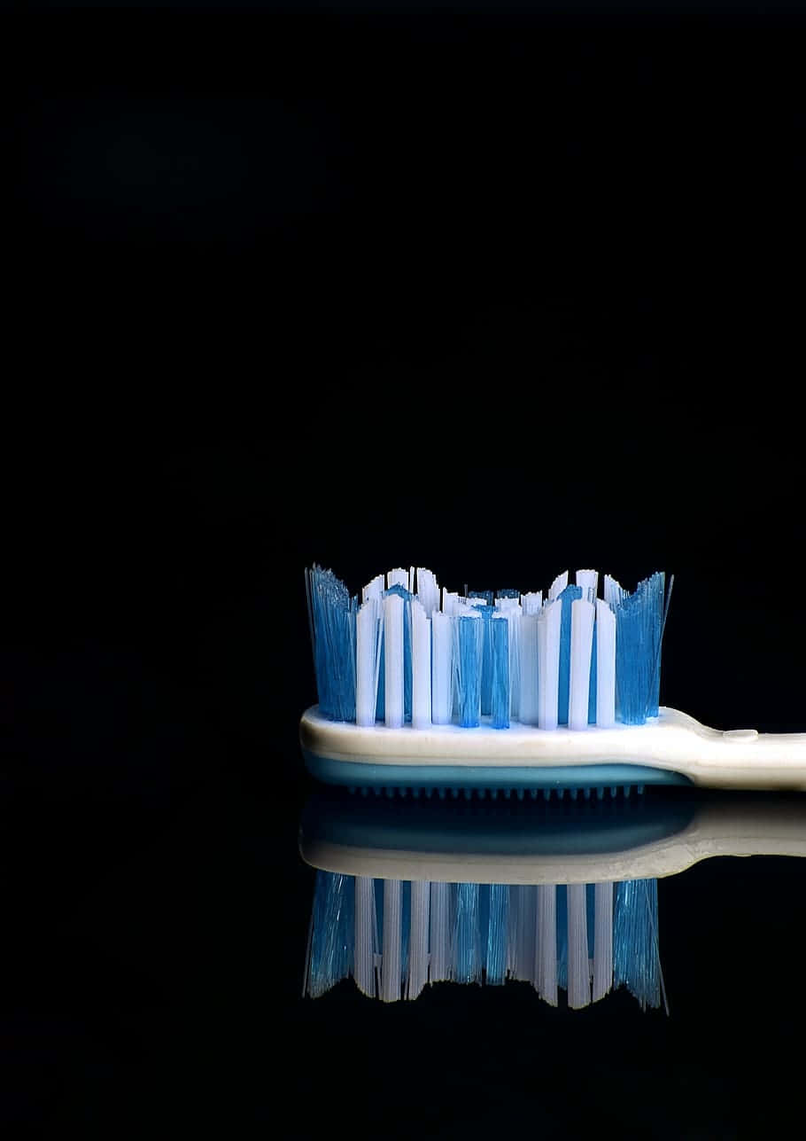 Close Up Toothbrush Reflection Wallpaper